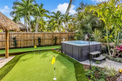 a view of a swimming pool with a patio