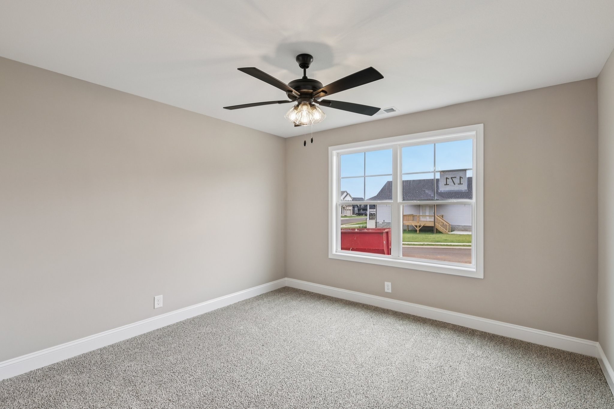 3 Echo Ridge Oak Grove, KY 42262 - Photo 29 of 46 an empty room with window and a ceiling fan