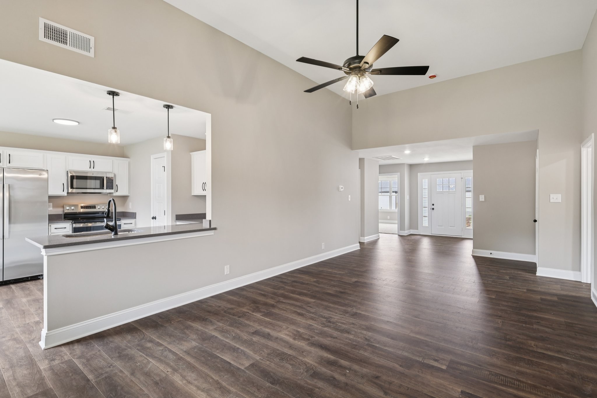 3 Echo Ridge Oak Grove, KY 42262 - Photo 9 of 46 a view of a kitchen with a sink a ceiling fan and stainless steel appliances