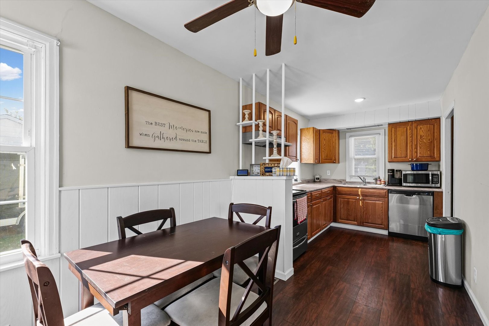 209 South Walnut Street Buckley, IL 60918 - Photo 11 of 30 a kitchen with a table chairs microwave and cabinets