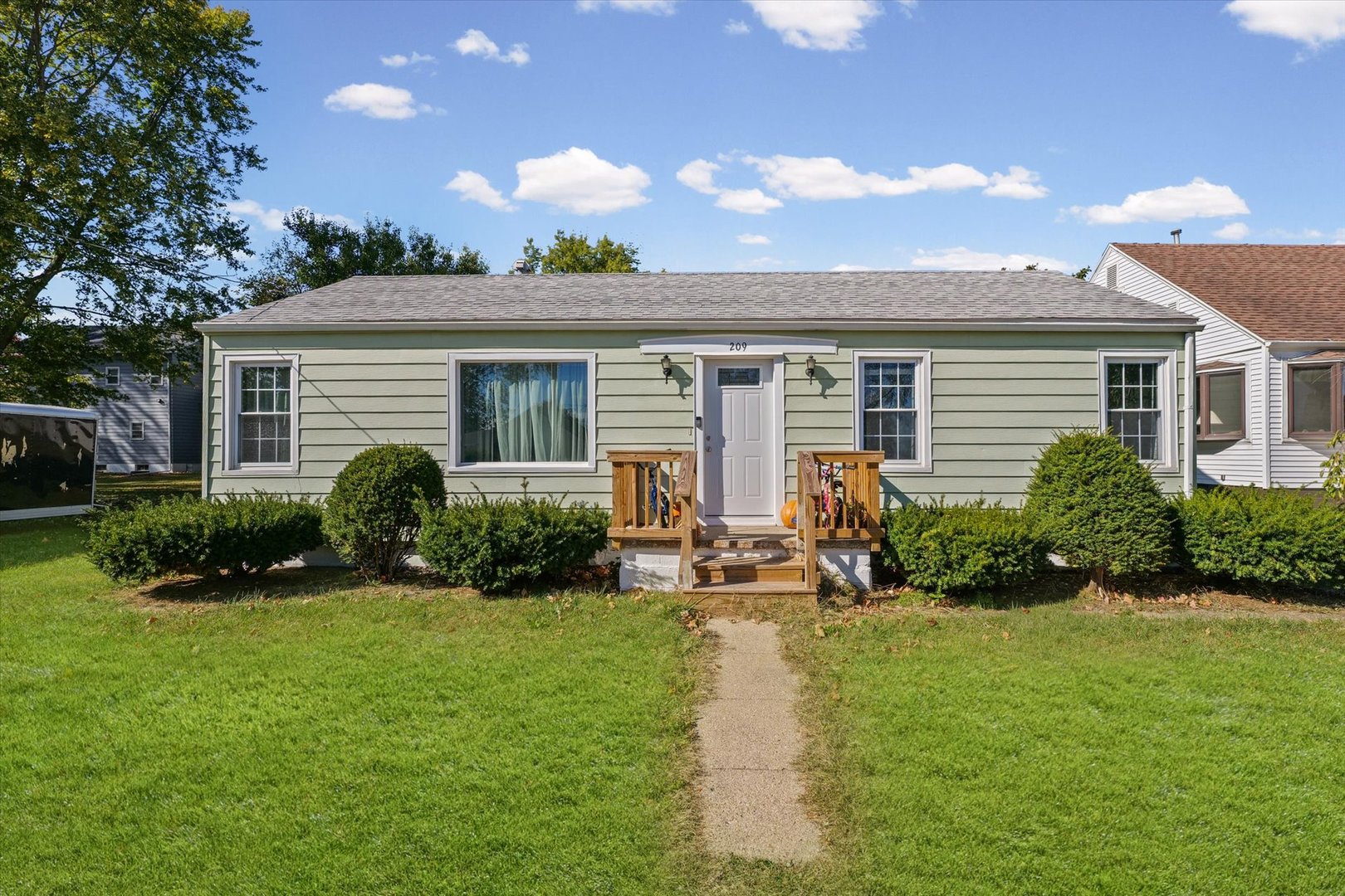209 South Walnut Street Buckley, IL 60918 - Photo 2 of 30 a front view of house with yard and green space