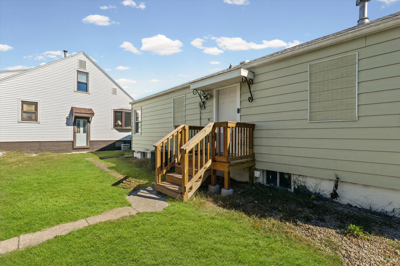 209 South Walnut Street Buckley, IL 60918 - Photo 23 of 30 a house view with a garden space