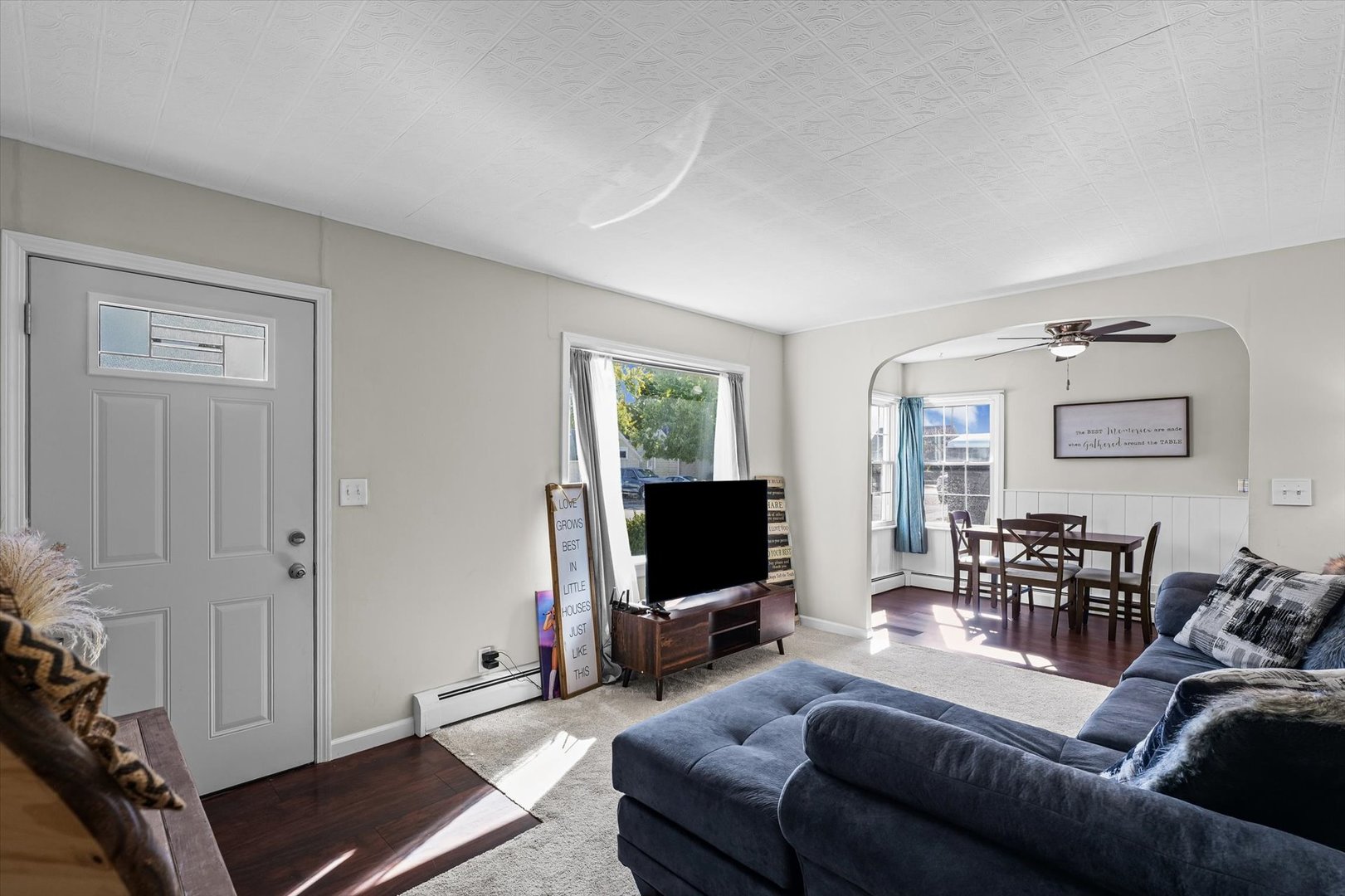 209 South Walnut Street Buckley, IL 60918 - Photo 7 of 30 a living room with furniture and a flat screen tv