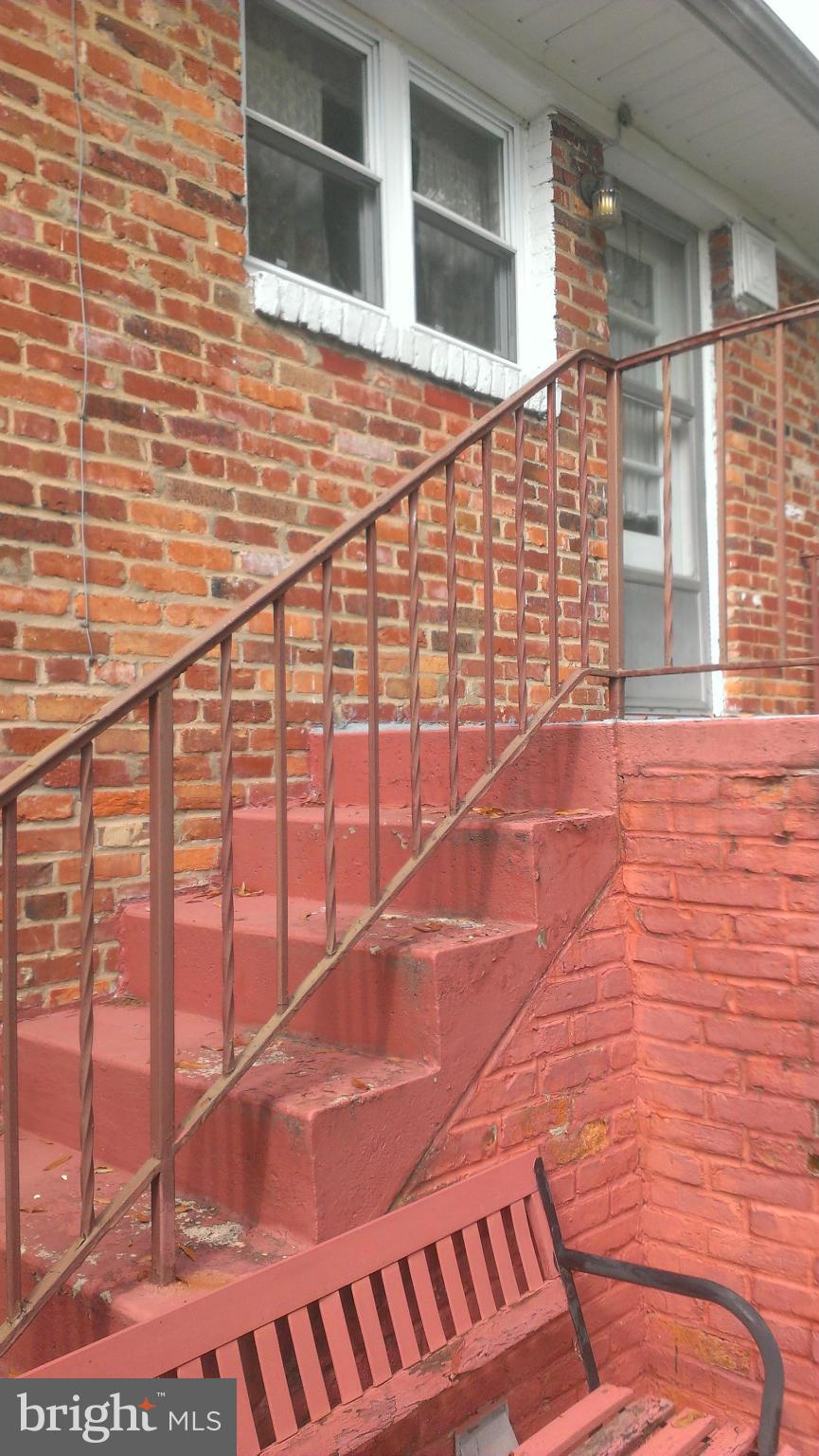 8601 11th Avenue Silver Spring, MD 20903 - Photo 7 of 16 Off kitchen steps w/under stair storage