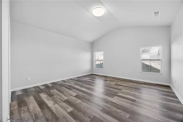 a view of an empty room and window