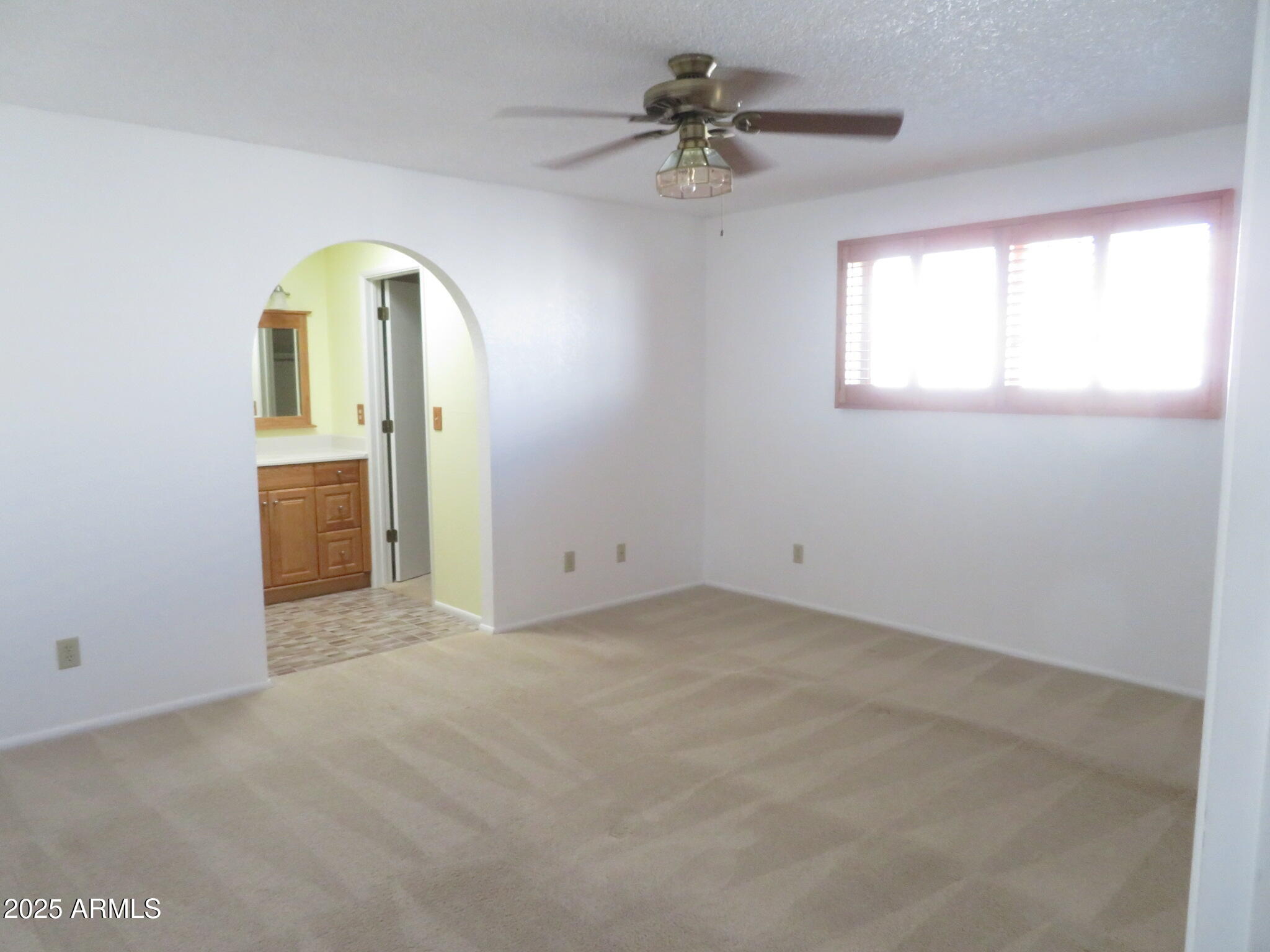 3720 Greenbrier Road Sierra Vista, AZ 85650 - Photo 14 of 30 a view of an empty room with a window