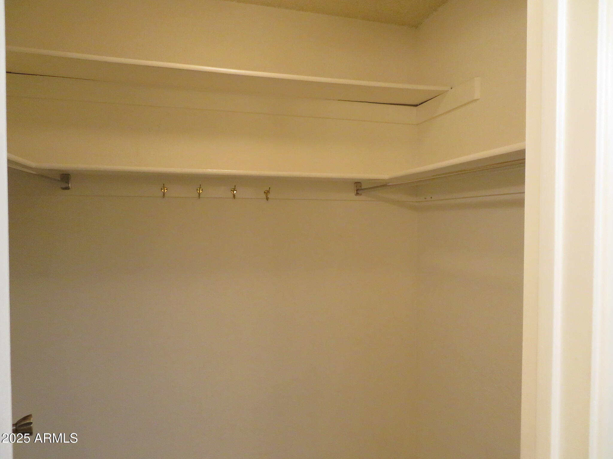 3720 Greenbrier Road Sierra Vista, AZ 85650 - Photo 17 of 30 a view of a room with racks on the wall