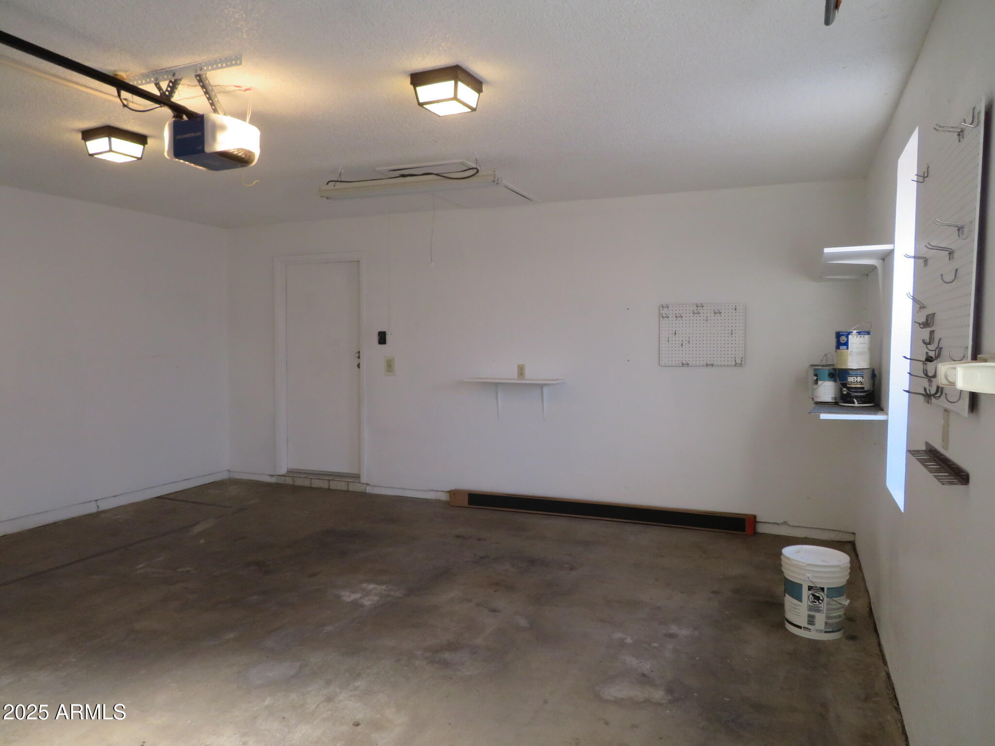 3720 Greenbrier Road Sierra Vista, AZ 85650 - Photo 24 of 30 a view of a room with wooden floor and window