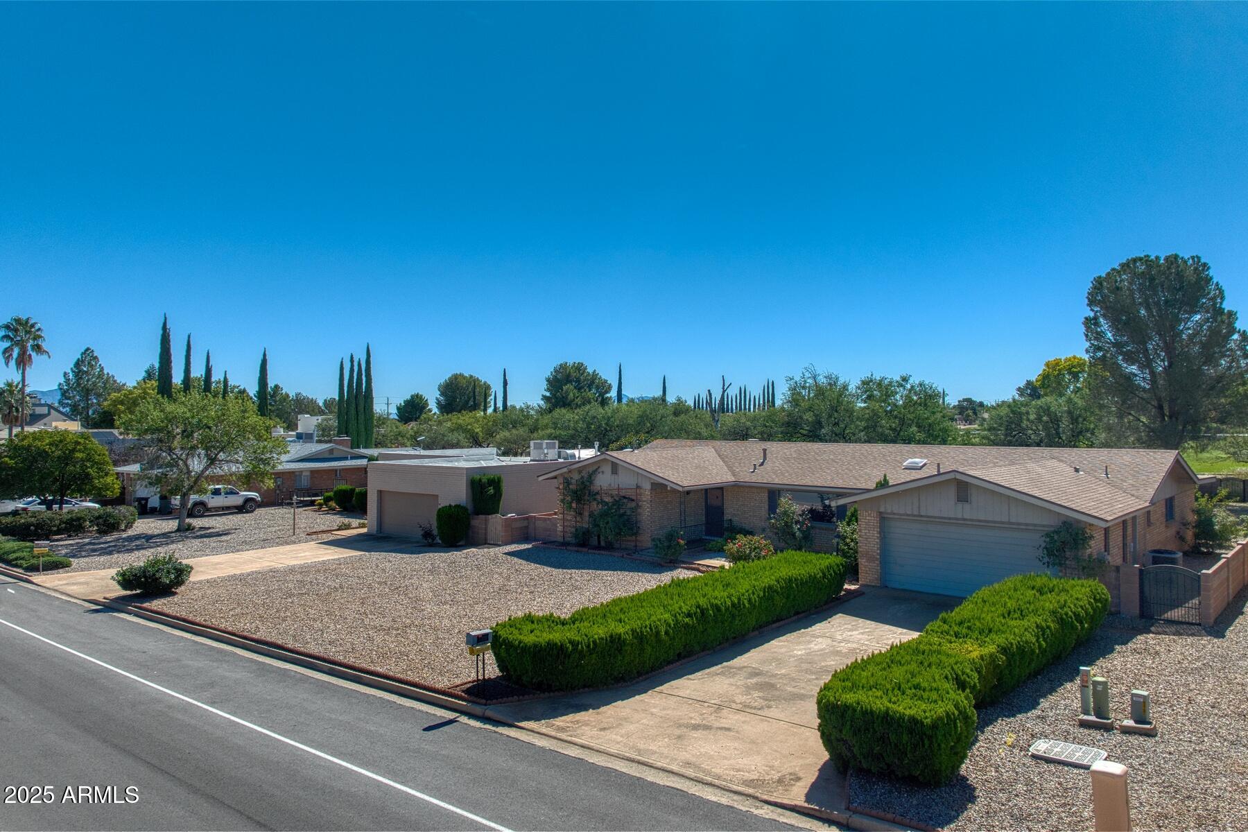 3720 Greenbrier Road Sierra Vista, AZ 85650 - Photo 27 of 30 a view of a patio with couches and a table and chairs