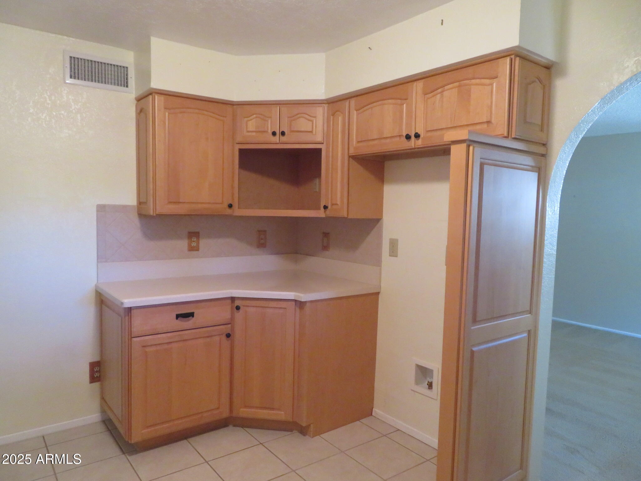 3720 Greenbrier Road Sierra Vista, AZ 85650 - Photo 10 of 30 a kitchen with stainless steel appliances granite countertop a refrigerator and a sink