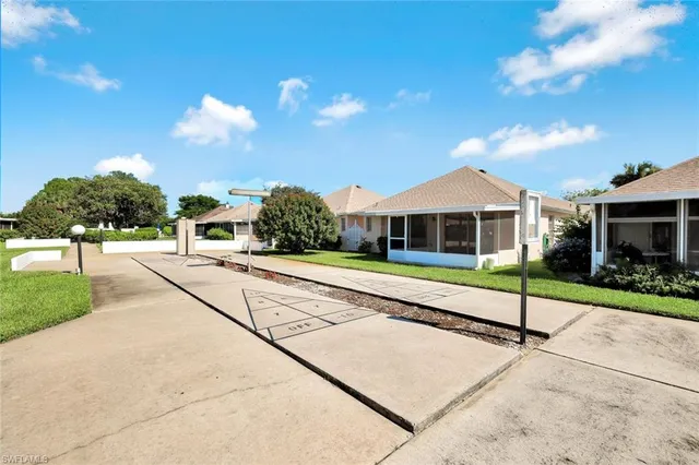 a view of house with outdoor space and street view