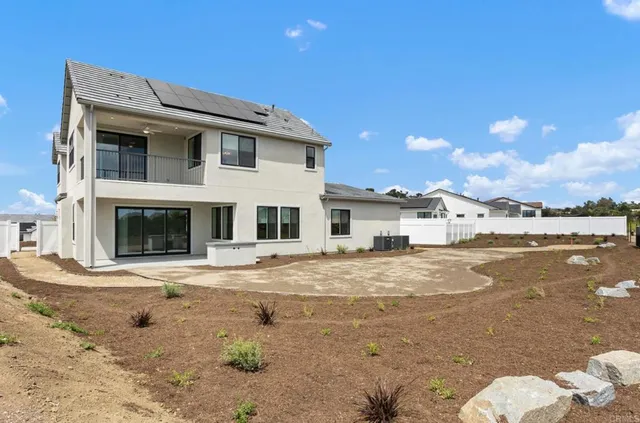 a view of a house with a ocean view