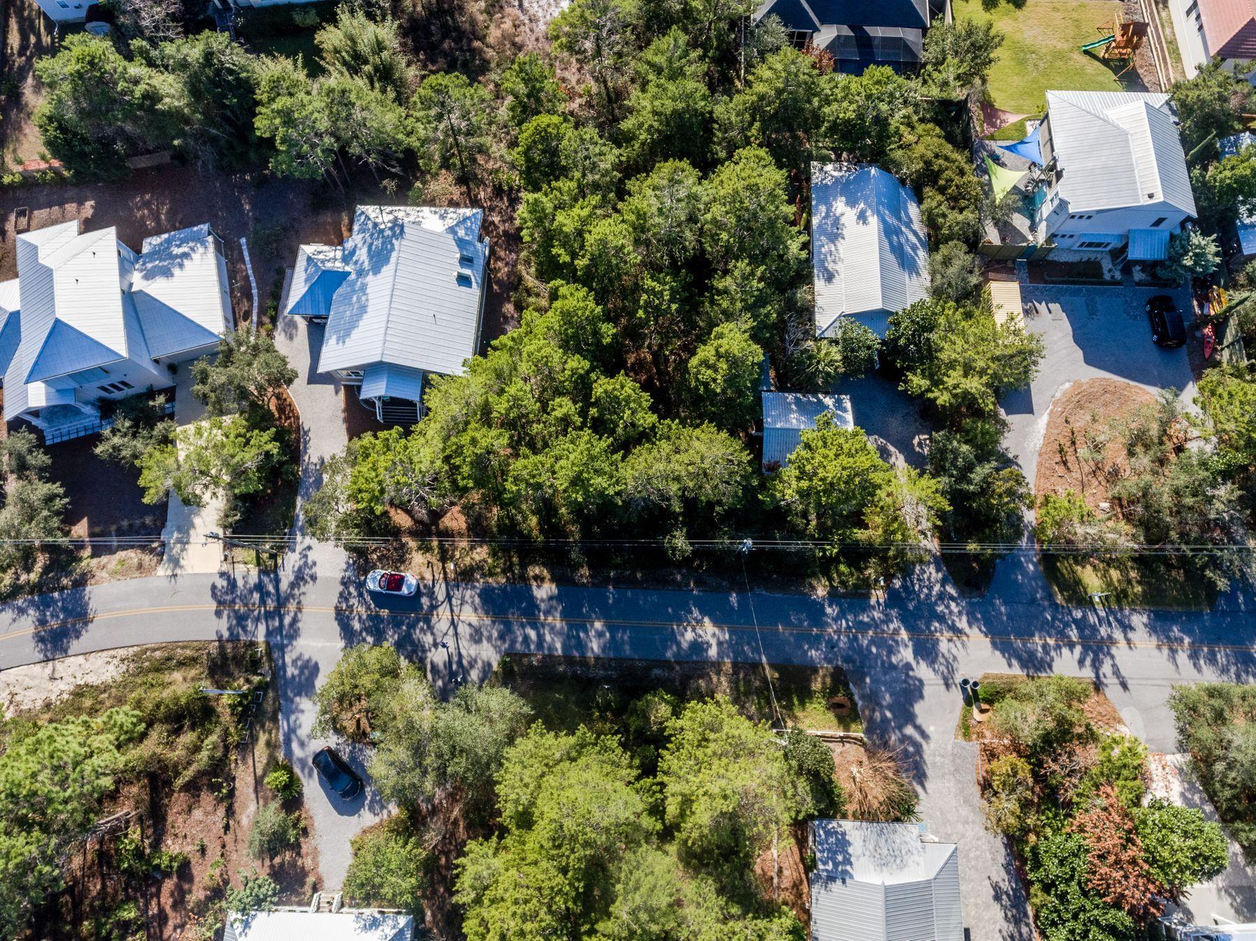 Lot 21 Crescent Road Santa Rosa Beach, FL 32459 - Photo 8 of 17 an aerial view of a house with a yard and garden