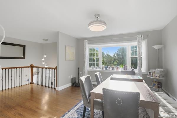 31 Laura Road Monroe, NY 10950 - Photo 17 of 39 a view of a dining room with furniture window and wooden floor