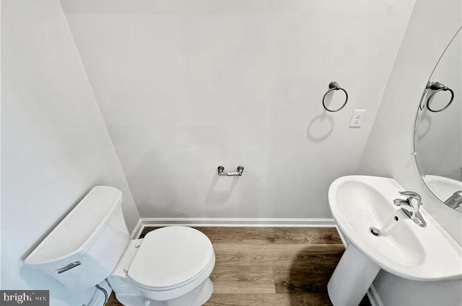 1184 Martin Road Breinigsville, PA 18031 - Photo 10 of 12 a bathroom with a sink mirror vanity and toilet