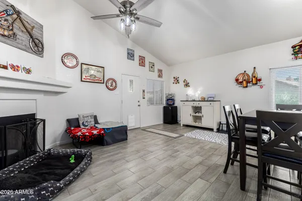 a kitchen with a table and cabinets