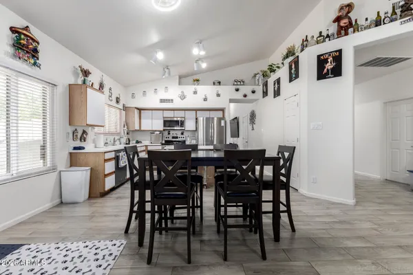 a view of a dining room with furniture