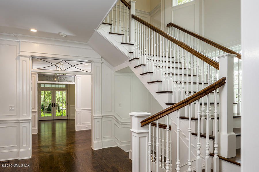 146 Hendrie Avenue Riverside, CT 06878 - Photo 11 of 32 a view of staircase with wooden floor and white walls