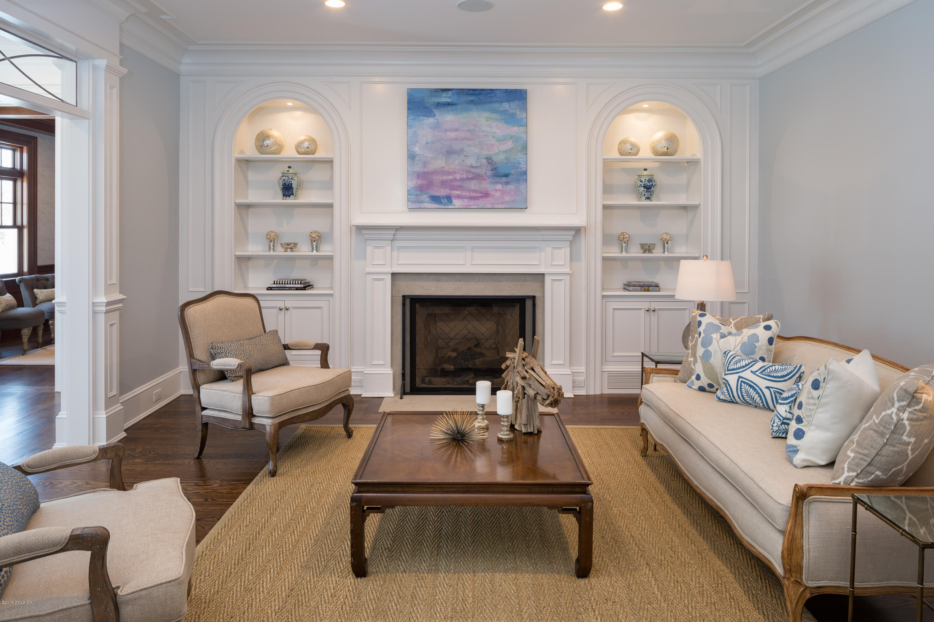 146 Hendrie Avenue Riverside, CT 06878 - Photo 13 of 32 a living room with furniture and a fireplace