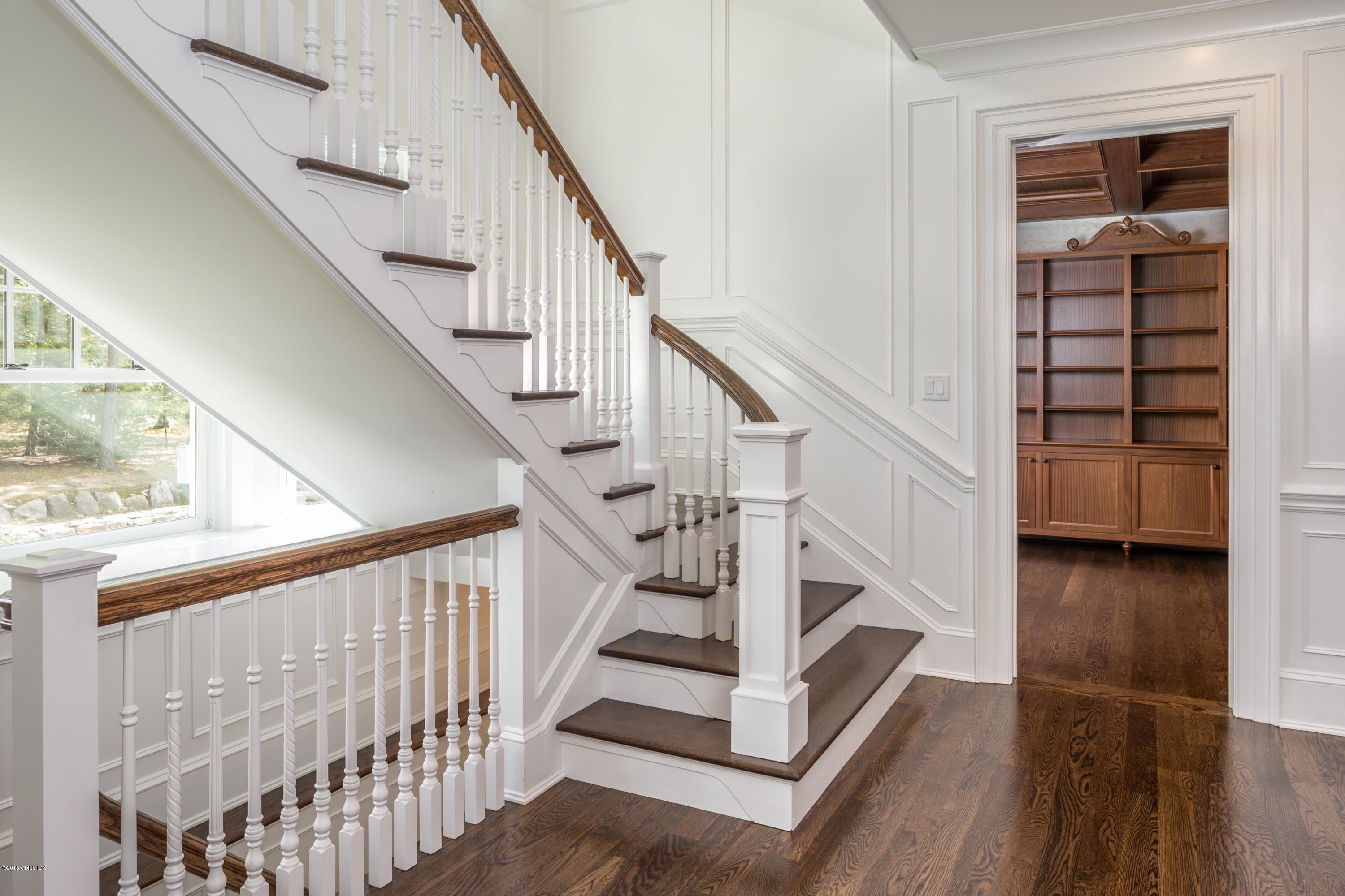 146 Hendrie Avenue Riverside, CT 06878 - Photo 15 of 32 a view of staircase with wooden floor and white walls