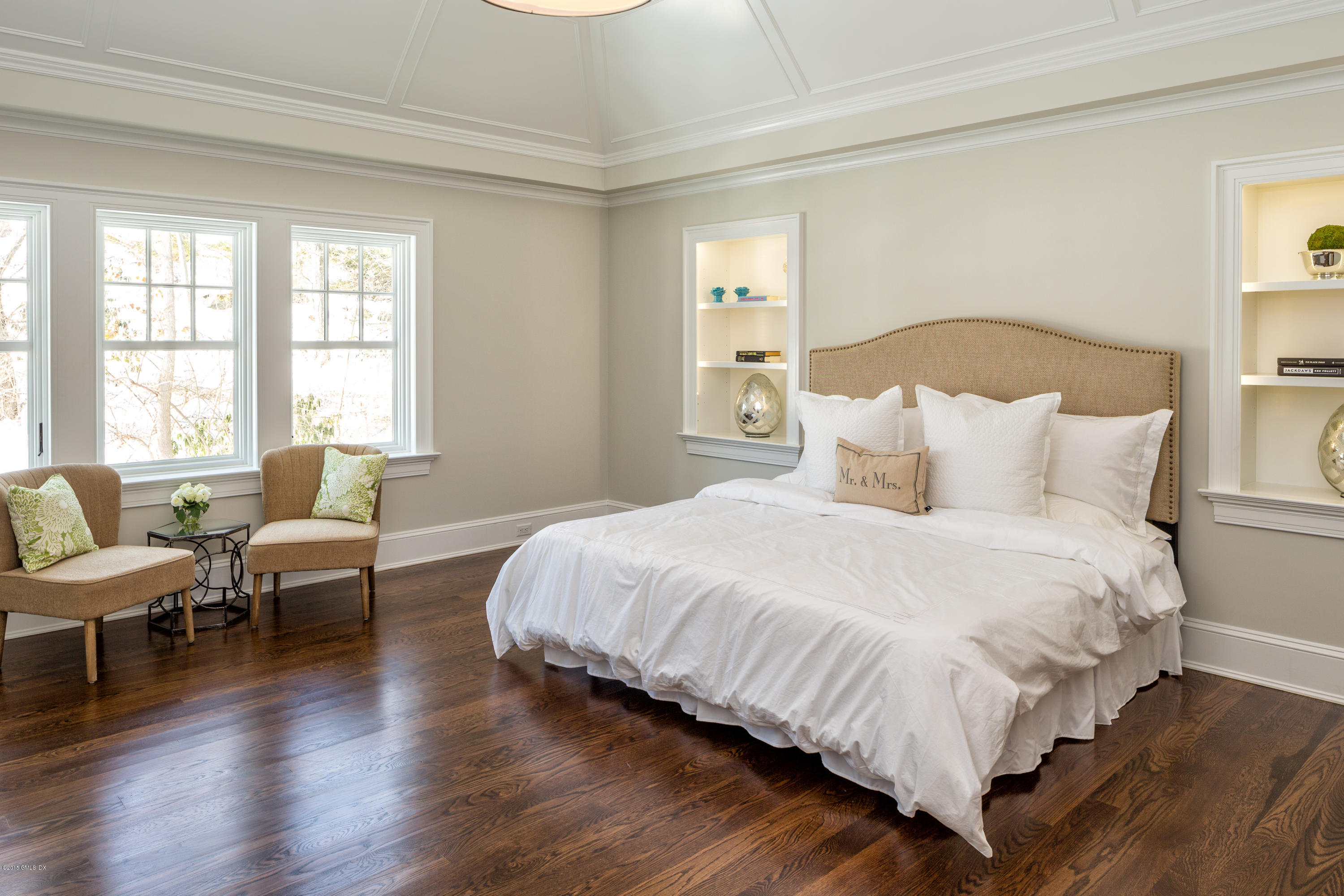 146 Hendrie Avenue Riverside, CT 06878 - Photo 19 of 32 a bedroom with bed and windows