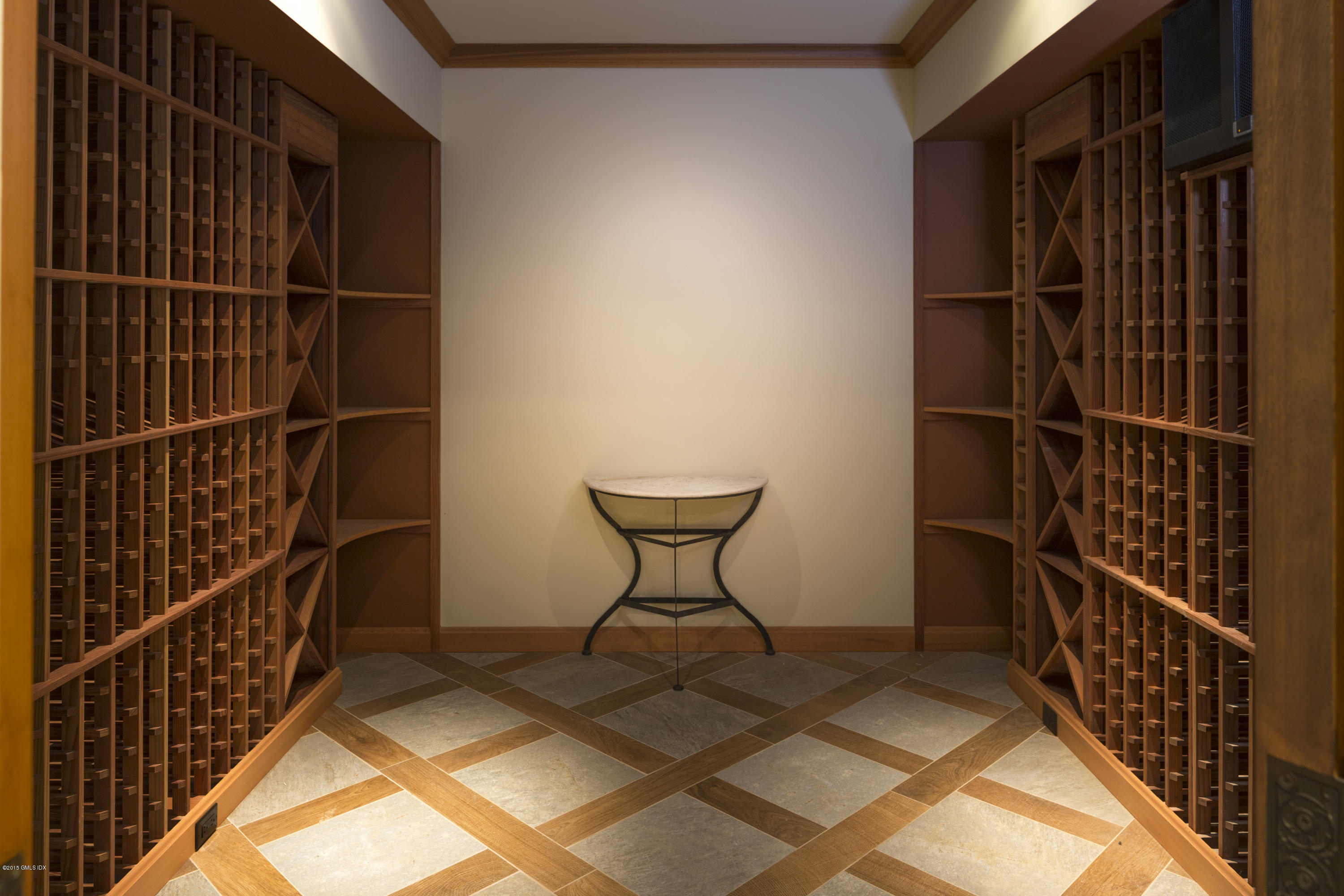 146 Hendrie Avenue Riverside, CT 06878 - Photo 29 of 32 a view of a chair and table in a gallery