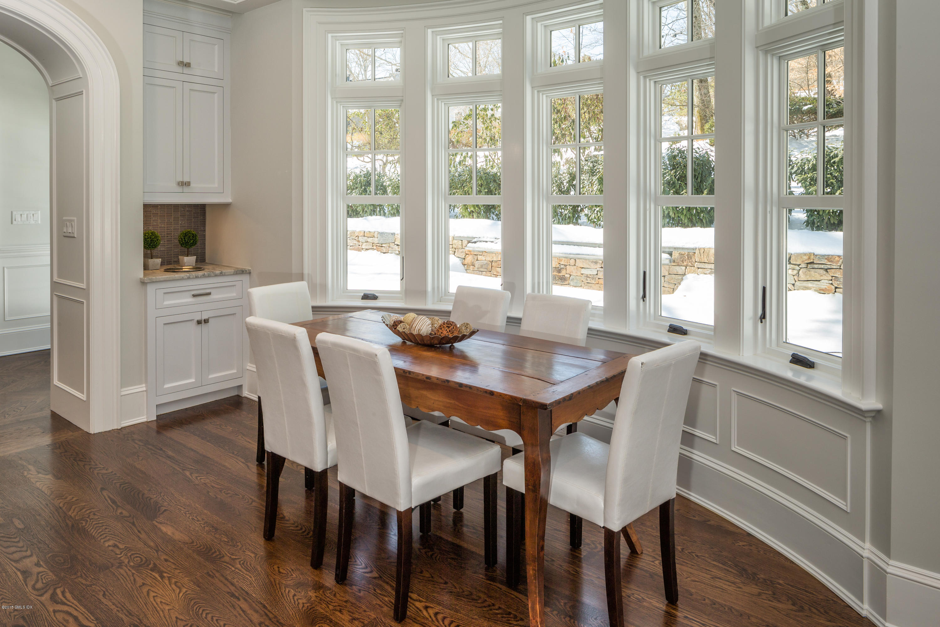 146 Hendrie Avenue Riverside, CT 06878 - Photo 3 of 32 a view of a dining room with furniture window and wooden floor