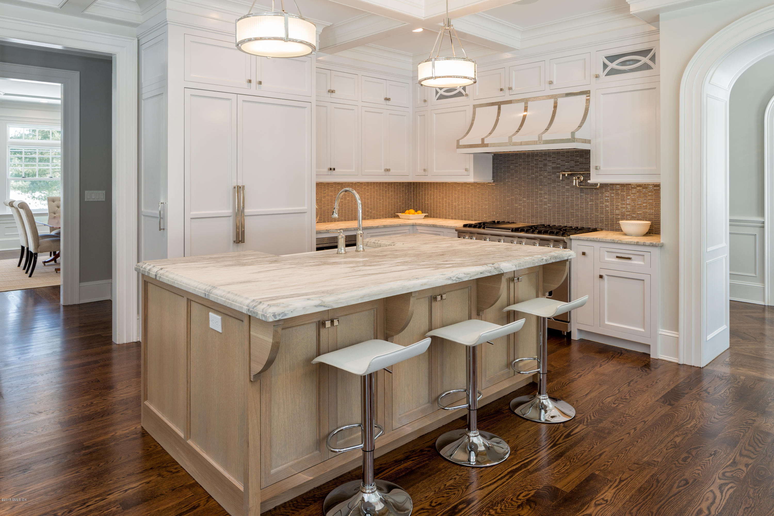 146 Hendrie Avenue Riverside, CT 06878 - Photo 4 of 32 a kitchen with a stove a sink and a refrigerator