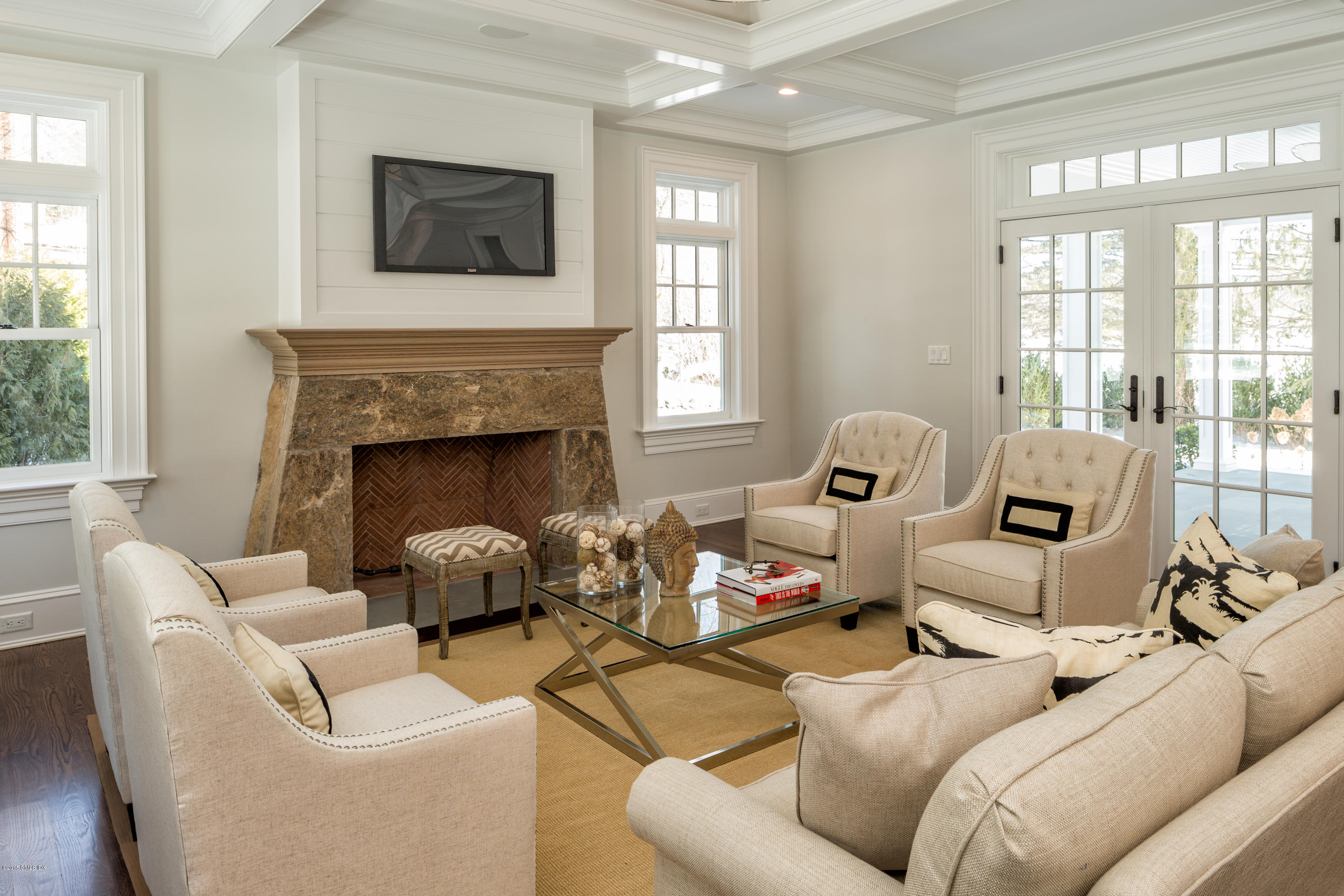 146 Hendrie Avenue Riverside, CT 06878 - Photo 5 of 32 a living room with furniture and a fireplace