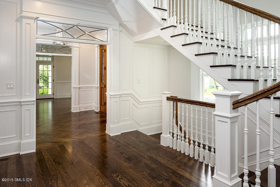 146 Hendrie Avenue Riverside, CT 06878 - Photo 10 of 32 a view of entryway and hall with wooden floor