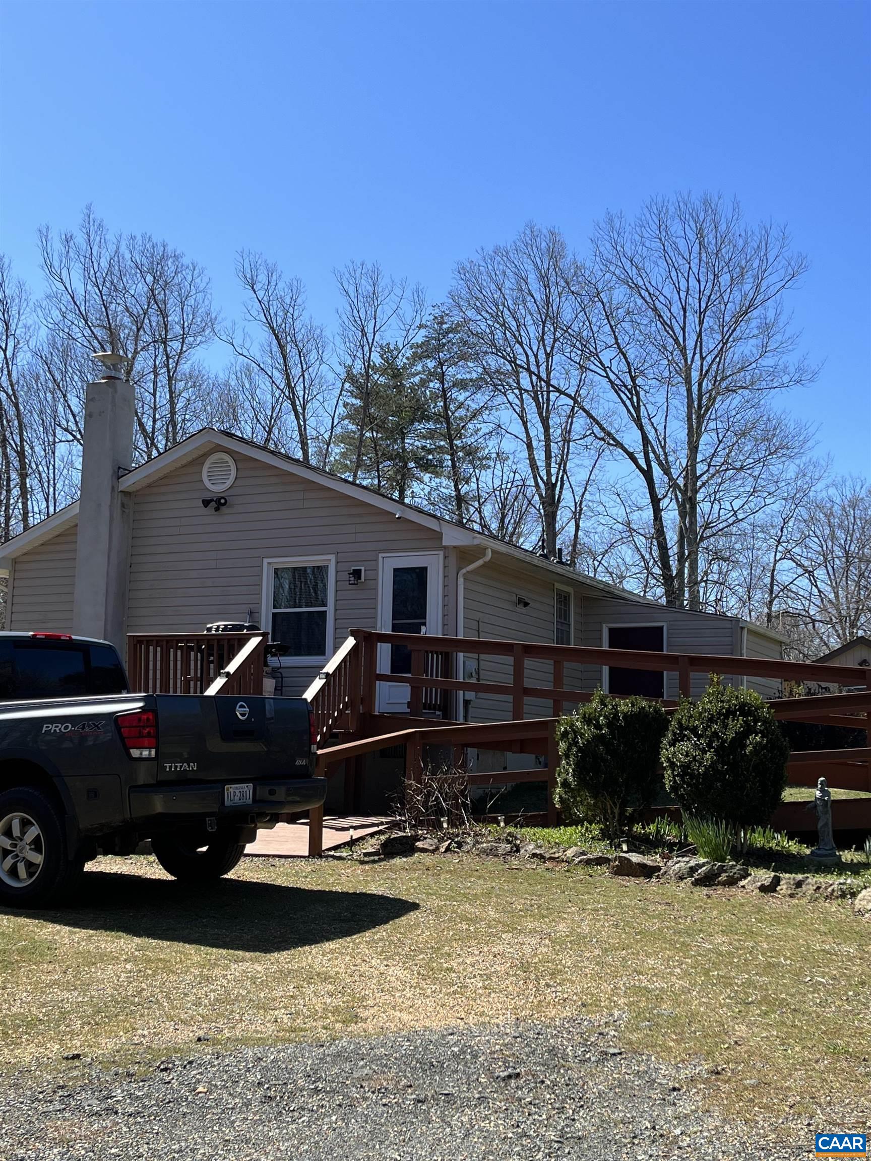 4244 Slam Gate Road Crozet, VA 22932 - Photo 3 of 3 a view of a house roof deck