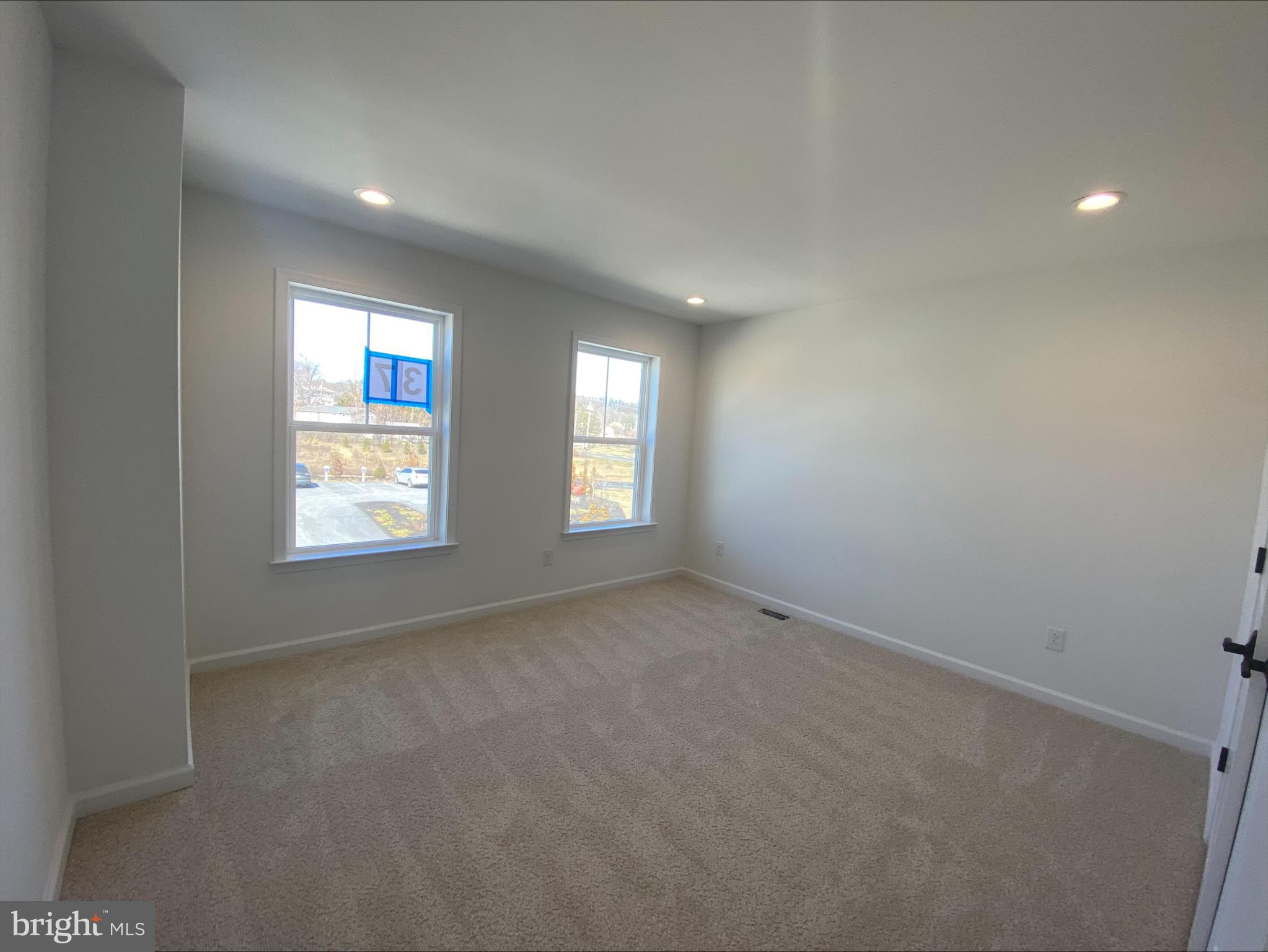 8 Valley Oak Road, Unit 37 Glenmoore, PA 19343 - Photo 12 of 15 an empty room with windows
