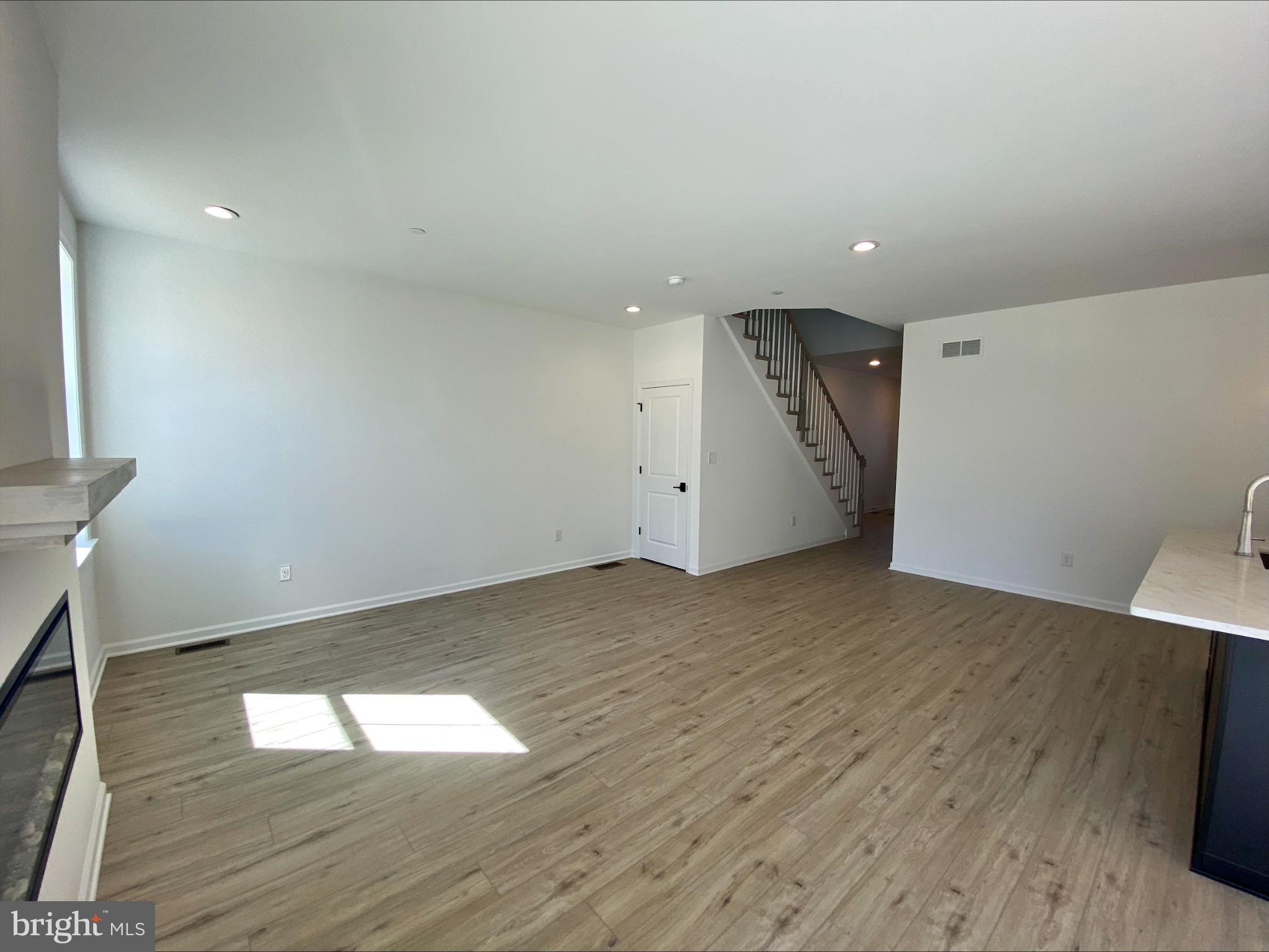 8 Valley Oak Road, Unit 37 Glenmoore, PA 19343 - Photo 5 of 15 a view of empty room with wooden floor