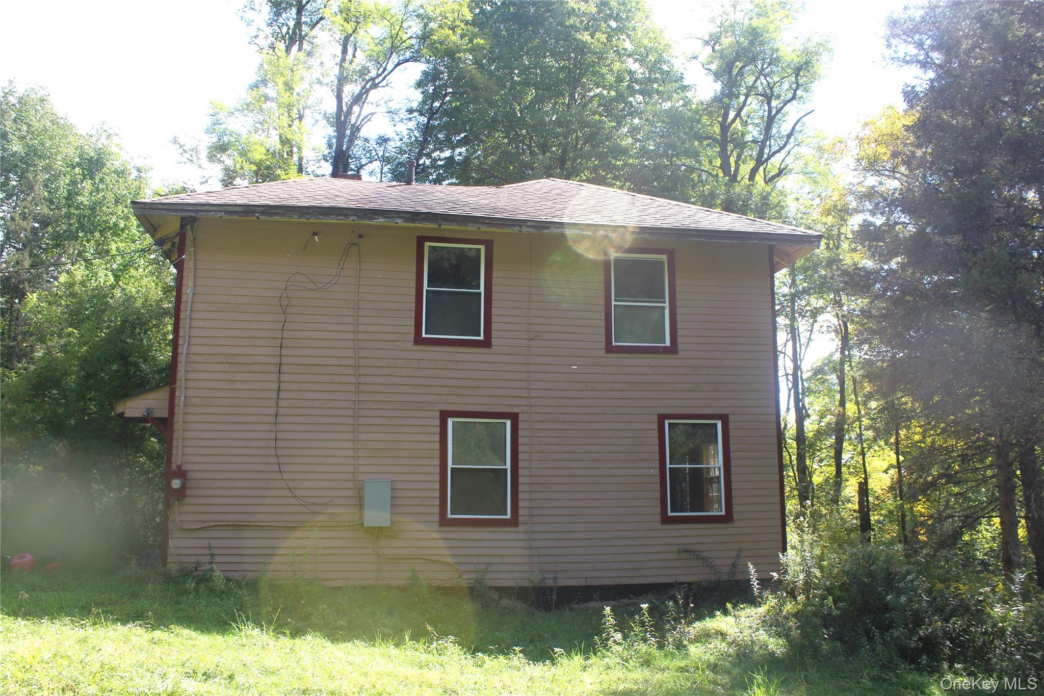 1934 Morton Hill Road Roscoe, NY 12776 - Photo 19 of 19 a front view of a house with a yard