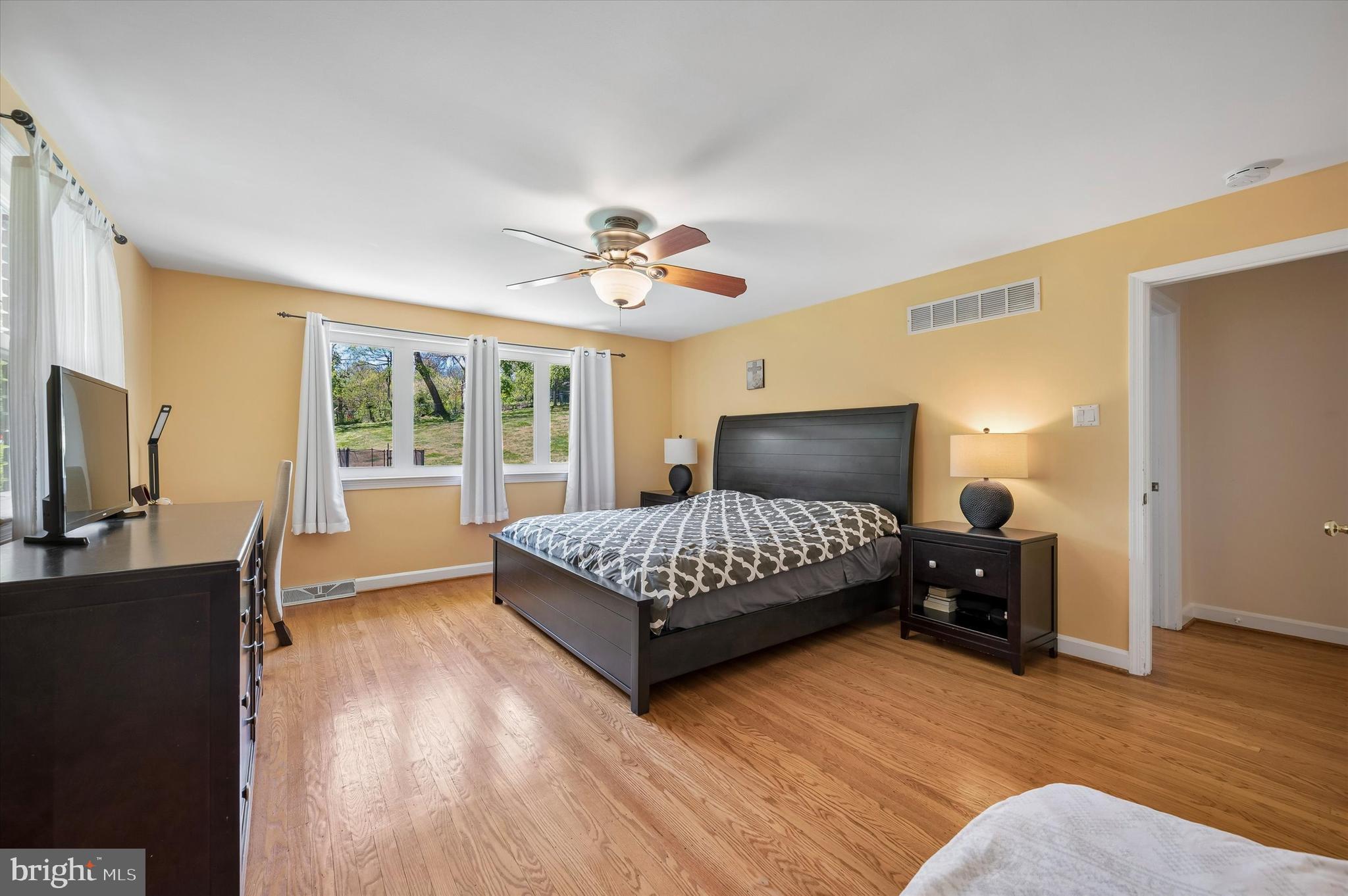 774 Robinhood Road Bryn Mawr, PA 19010 - Photo 14 of 28 a bedroom with a bed and wooden floor