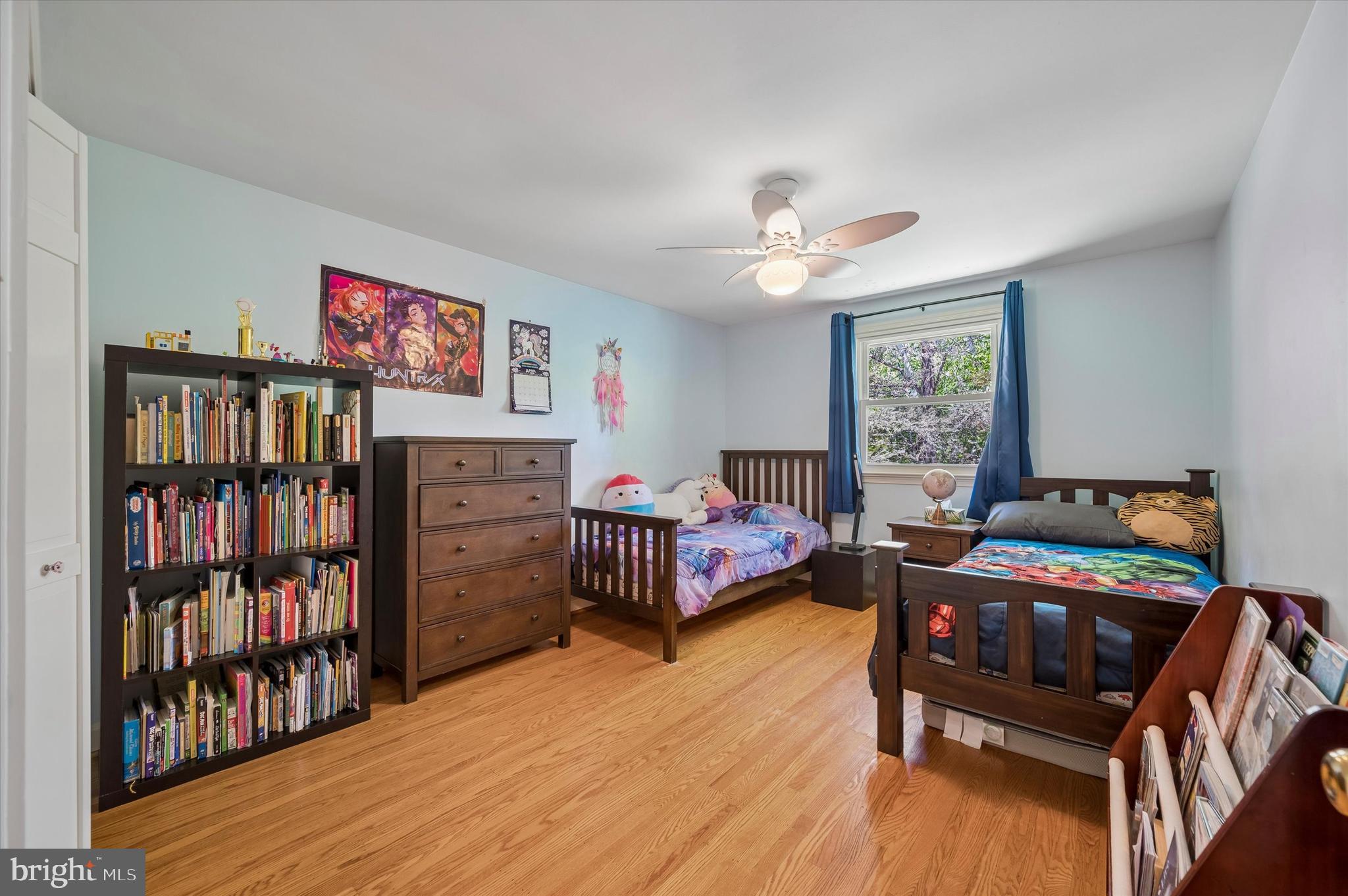 774 Robinhood Road Bryn Mawr, PA 19010 - Photo 16 of 28 a bedroom with furniture and a book shelf