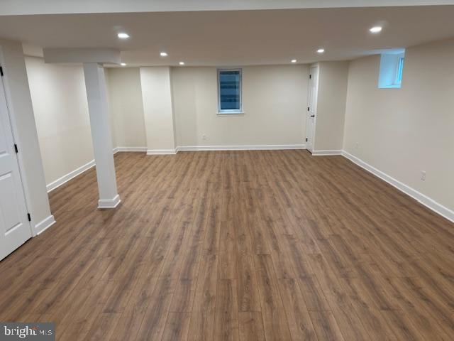 774 Robinhood Road Bryn Mawr, PA 19010 - Photo 24 of 28 an empty room with wooden floor and windows