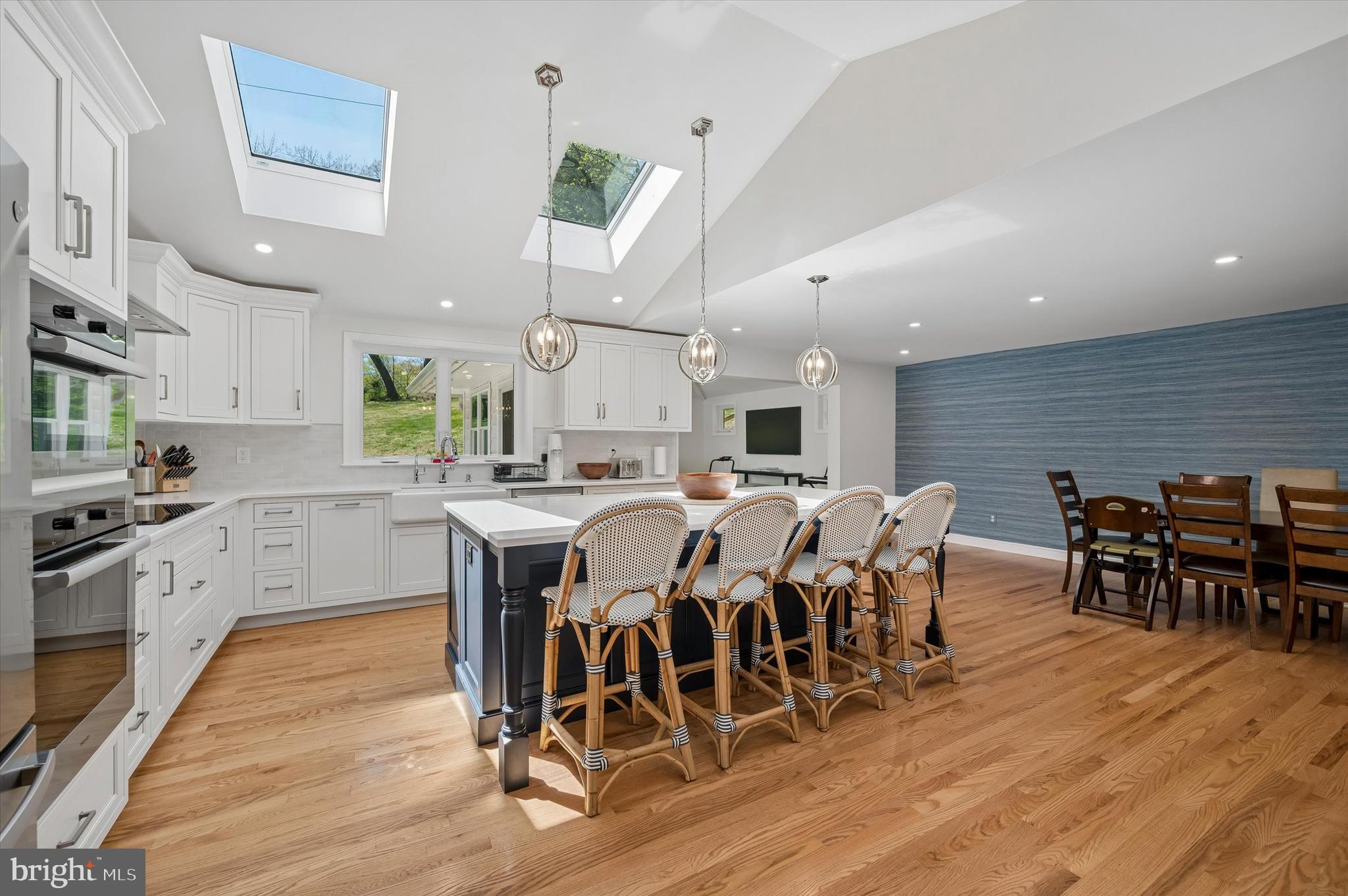 774 Robinhood Road Bryn Mawr, PA 19010 - Photo 10 of 28 a large kitchen with a table and chairs in it