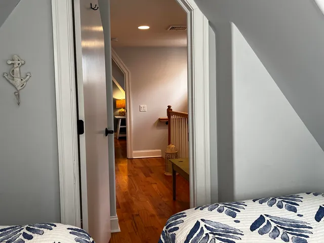 a view of a living room with a fireplace