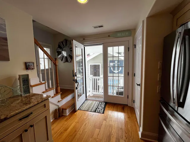 a front view of a house with table and chairs