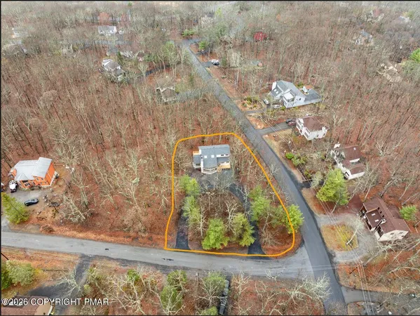a view of swimming pool from a balcony