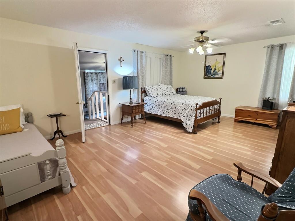 300 South Miller Street Rising Star, TX 76471 - Photo 15 of 39 a bedroom with a bed and furniture