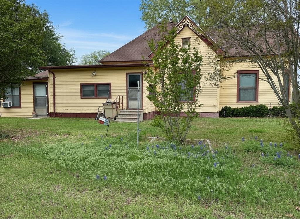 300 South Miller Street Rising Star, TX 76471 - Photo 2 of 39 a view of a house with a yard