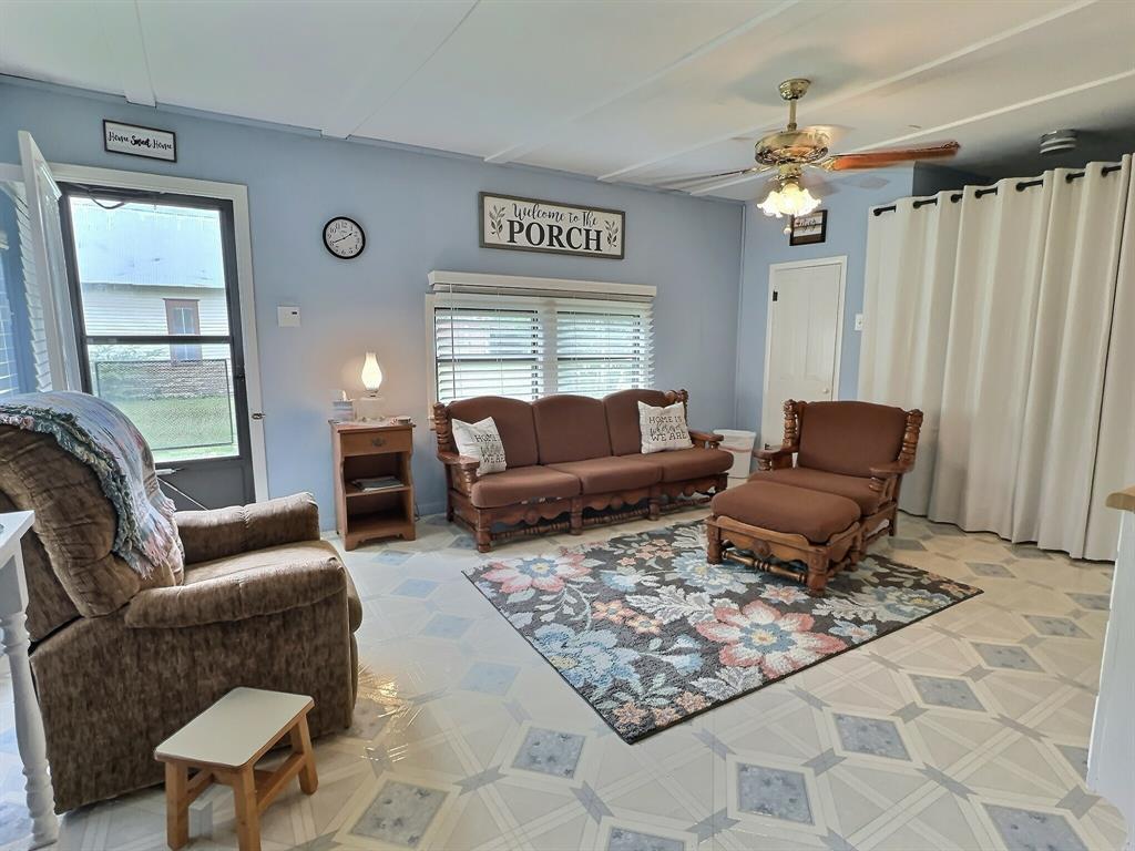 300 South Miller Street Rising Star, TX 76471 - Photo 24 of 39 a living room with furniture and a window