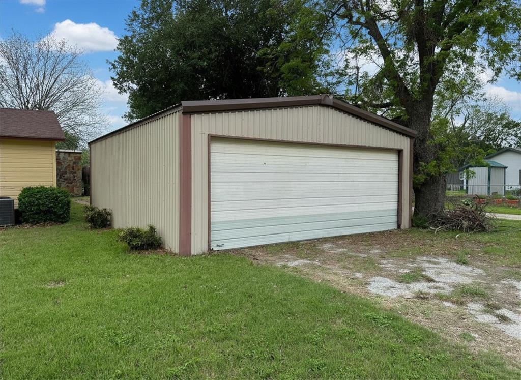 300 South Miller Street Rising Star, TX 76471 - Photo 27 of 39 a view of backyard of house
