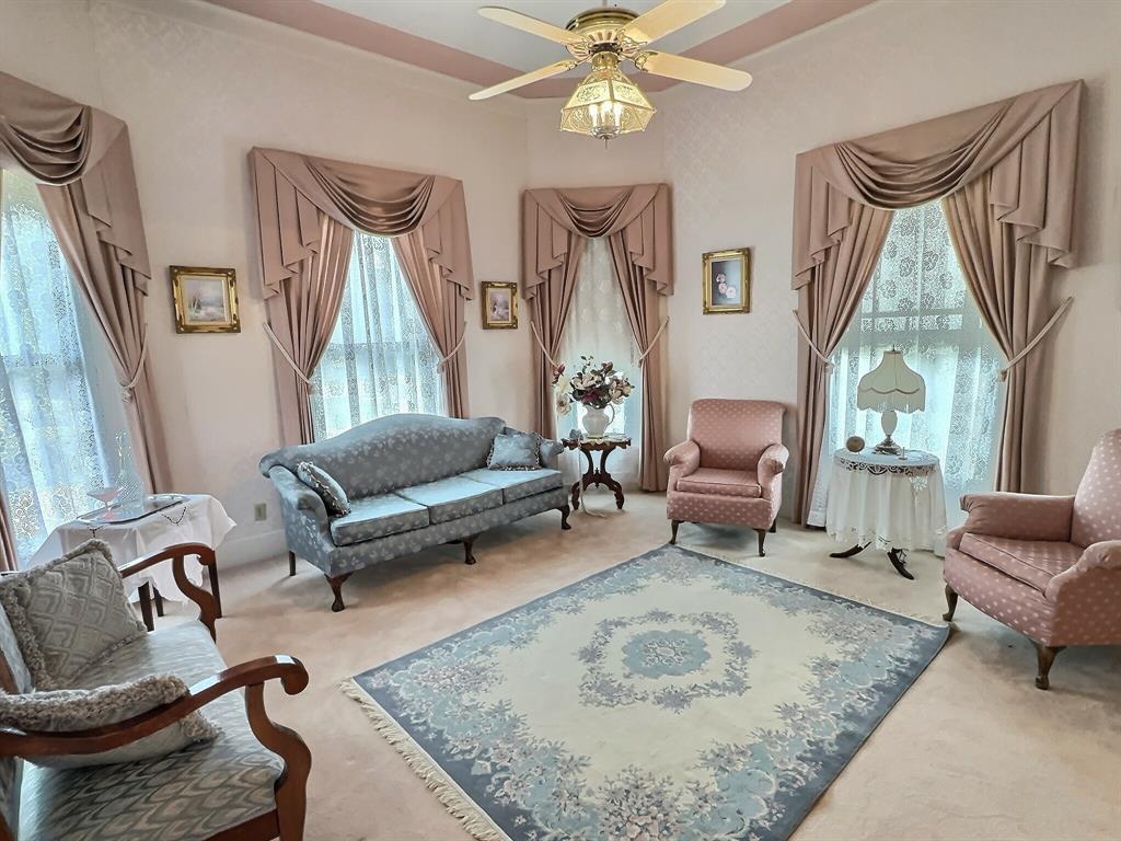 300 South Miller Street Rising Star, TX 76471 - Photo 9 of 39 a living room with furniture and a rug