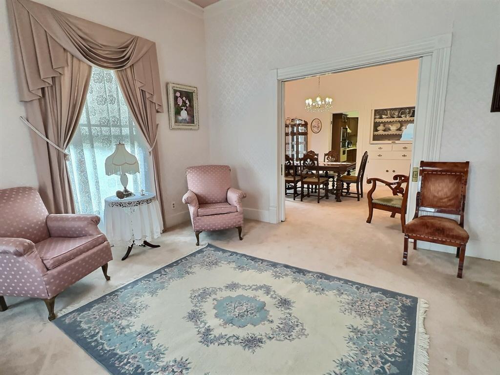 300 South Miller Street Rising Star, TX 76471 - Photo 10 of 39 a living room with furniture and a rug