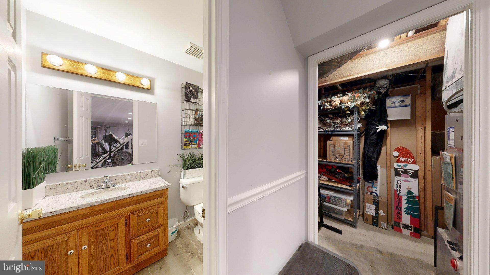 11901 Rustic Farm Court Germantown, MD 20874 - Photo 103 of 134 Charming bath with hidden storage space.