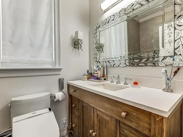 a bathroom with a sink and a toilet