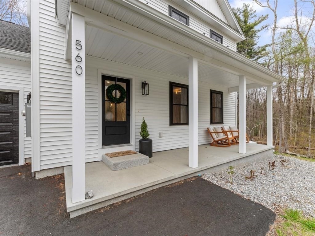 560 Queen Lake Road Phillipston, MA 01331 - Photo 3 of 42 a view of a house with a outdoor space